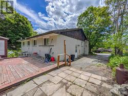 Side Entrance and Back Deck/Patio - 