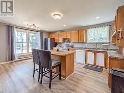 Main Floor: Open Concept Kitchen, Living & Dining - 