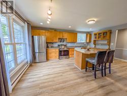 Main Floor: Open Concept Kitchen, Living & Dining - 