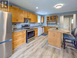 Main Floor: Open Concept Kitchen, Living & Dining - 
