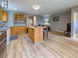 Main Floor: Open Concept Kitchen, Living & Dining - 