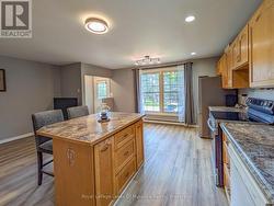 Main Floor: Open Concept Kitchen, Living & Dining - 