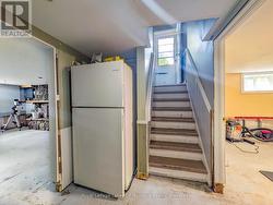 Basement: Side Entrance & Under Stairs Storage - 