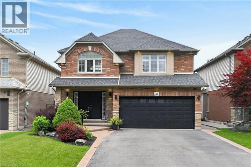 Beautiful landscaping, parking for 4 cars, plus double car driveway - 43 Wilbur Drive, Binbrook, ON 