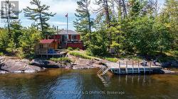 Front of property with Pine Bunkie and Powder Room - 