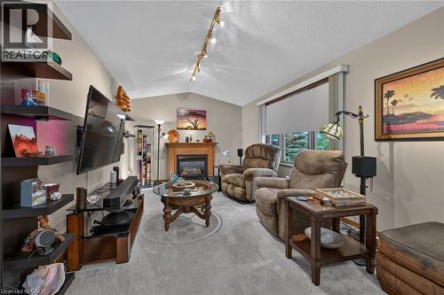84 Jamieson Drive, Caledonia, ON - Indoor Photo Showing Living Room With Fireplace