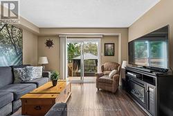 Living Room with w/o to the Back Deck and Gazebo - 