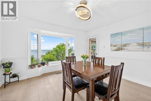 Bay window offering expansive water scenery - 15 Cheval Drive, Grimsby, ON - Indoor Photo Showing Dining Room