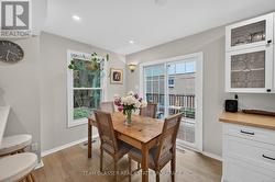 Patio doors off eating area to BBQ and Deck - 