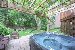 Hot-tub lights at night for serene evening dip. - 