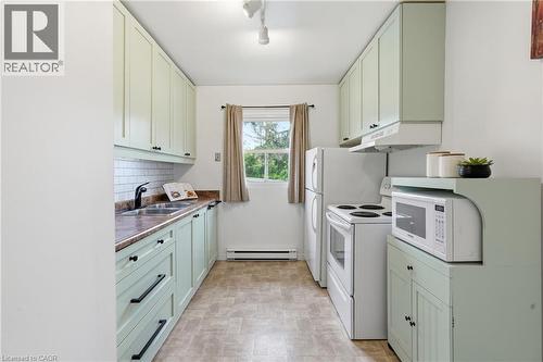 513 Weber Street N Unit# B, Waterloo, ON - Indoor Photo Showing Kitchen With Double Sink