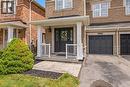 Brick facade with stone accents and white trim - 4670 Thomas Alton Boulevard, Burlington, ON 