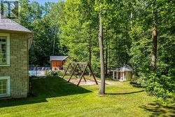 side yard - play equipment is included - 