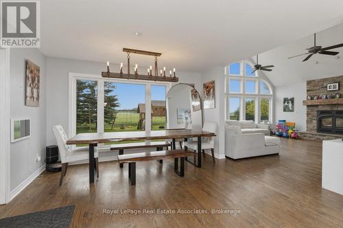 6-7 - 321311 Concession Road, East Luther Grand Valley, ON - Indoor Photo Showing Dining Room With Fireplace