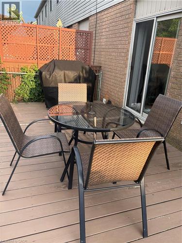 Composite deck surface with a lattice privacy screen and sliding glass door access - 125 Terni Boulevard, Hamilton, ON - Outdoor With Deck Patio Veranda With Exterior