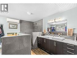 Primary ensuite with custom tile shower - 