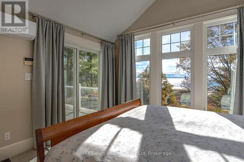 Primary Bedroom SGD to Deck - 86 Nottawaga Drive, Tiny, ON 
