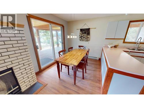 1725 6Th Ave Avenue, Invermere, BC - Indoor Photo Showing Dining Room With Fireplace