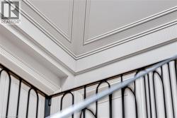 Detailed architectural millwork featuring dentil molding and paneling - 