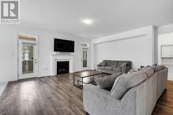 Family Room with FP & Dual Access to Muskoka Room - 