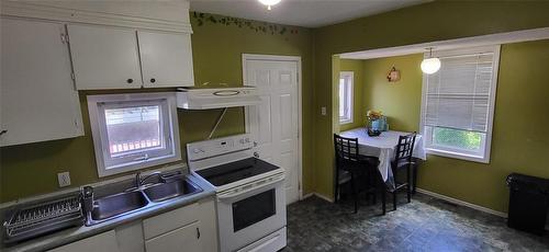 KT/dining area - 23 Princess Avenue E, Brandon, MB 