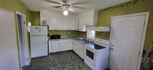 Spacious kitchen - 23 Princess Avenue E, Brandon, MB 