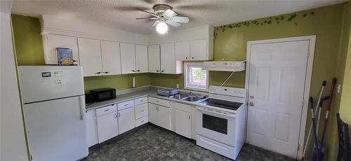 KT - 23 Princess Avenue E, Brandon, MB 