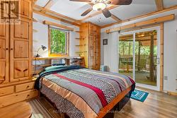 Primary bedroom with built-in cabinetry - 