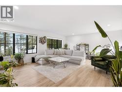 Large windows with lake views & open floor plan rancher - 