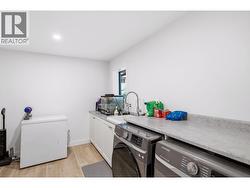 Large laundry/storage room with window - multifunctional - 