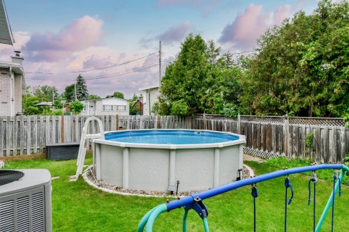 Piscine - 433 100E Avenue, Laval (Chomedey), QC - Outdoor With Above Ground Pool With Backyard
