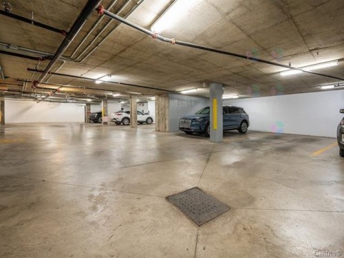 Garage - 305-331 Av. De Venise O., Venise-En-Québec, QC - Indoor Photo Showing Garage