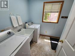 Main Floor Laundry / Access to Garage - 