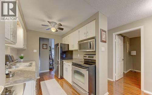 458 Beechwood Place Unit# 3, Waterloo, ON - Indoor Photo Showing Kitchen With Double Sink