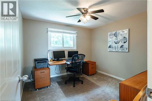 Room featuring neutral wall paint, a window with horizontal blinds, and a ceiling fan with integrated lighting - 28 Mcgibbon Court, Kitchener, ON 