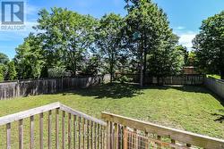 Treed, fenced yard - 