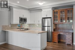 Breakfast bar in kitchen - 