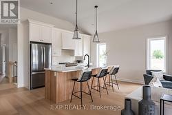 Completed model photo. Finishes vary. - 