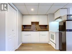 Kitchen in basement suite. - 
