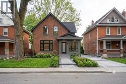 virtual design - IDEAS optional updates for exterior with dark trim and a gabled roofline - 