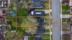 Expansive lot with mature trees and a residential street frontage - 