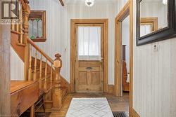 Hardwood staircase with turned balusters and newel post - 