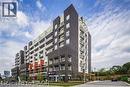 Contemporary multi-story building featuring dark brick and light-colored siding - 280 Lester Street Unit# 607, Waterloo, ON 