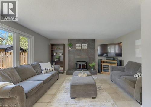 14 Rose Garden Street, Kitchener, ON - Indoor Photo Showing Living Room With Fireplace
