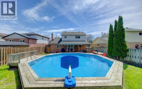 5' deep in the middle - 14 Rose Garden Street, Kitchener, ON - Outdoor With Above Ground Pool With Backyard