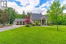 This large home sits on 1.5 acres of beautifully landscaped property - 59 Decou Road, Simcoe, ON 