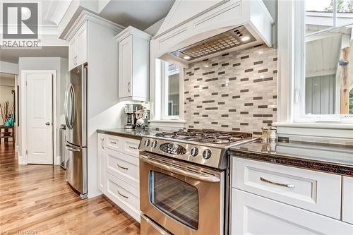 The kitchen is a chef's dream with lots of room to move, plenty of storage and lots of light. - 59 Decou Road, Simcoe, ON 