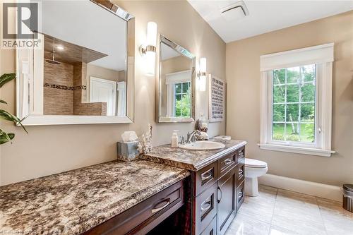 Primary ensuite with double sink and vanity counter - 59 Decou Road, Simcoe, ON 