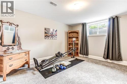 Second lower level bedroom with egress window. - 59 Decou Road, Simcoe, ON 