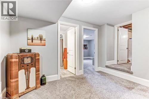 Part of the rec-room showing access to bath and bedrooms. - 59 Decou Road, Simcoe, ON 
